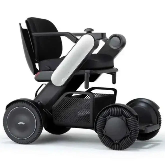 Allied Medical WHILL Model C2 Standard Powerchair Allied Medical WHILL Model C2,maneuverability,Model C2,Omni-wheels,Patented Omni-wheels,powerchair,powerchair accessories,powerchair scooter,Standard Powerchair,superior maneuverability,Travelling with a p