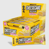 Muscle Nation cheesecake protein bar in lemon flavor packaging, featuring delicious cheesecake design.
