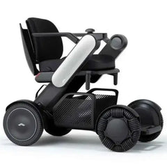 Allied Medical WHILL Model C2 Standard Powerchair Allied Medical WHILL Model C2,maneuverability,Model C2,Omni-wheels,Patented Omni-wheels,powerchair,powerchair accessories,powerchair scooter,Standard Powerchair,superior maneuverability,Travelling with a p