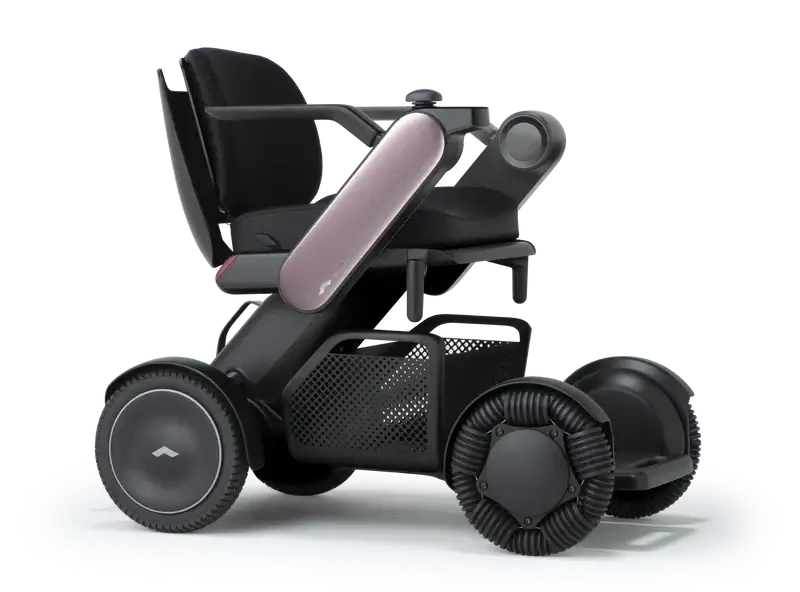Allied Medical WHILL Model C2 Standard Powerchair Allied Medical WHILL Model C2,maneuverability,Model C2,Omni-wheels,Patented Omni-wheels,powerchair,powerchair accessories,powerchair scooter,Standard Powerchair,superior maneuverability,Travelling with a p